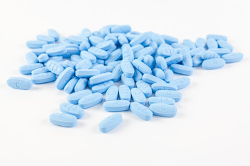 Blue pills on white background
