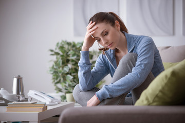 Depressed woman at home