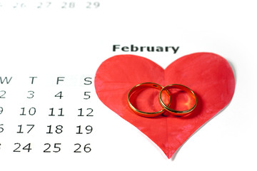 Calendar . February . Heart. Two rings. 14 February. Concept for Valentines day.