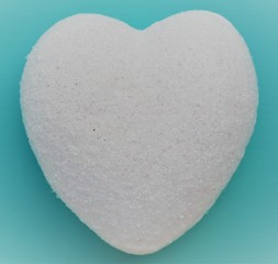 a white heart with a blue background color