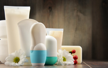 Composition with containers of body care and beauty products