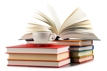 Composition with books and cup of coffee isolated on white