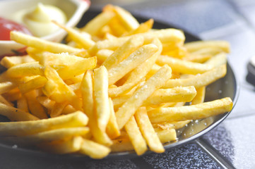 French fries with ketchup and mayonnaise