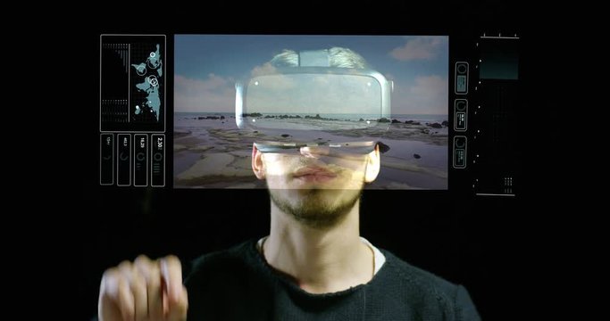 A boy uses the oculus and augmented reality interface traveling in 3D graphics. A virtual trip but real, innovative technology, Concept: technology, oculus, augmented reality and hologram.