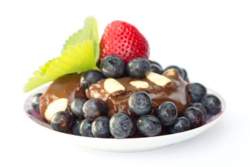 homemade chocolate dessert with berries