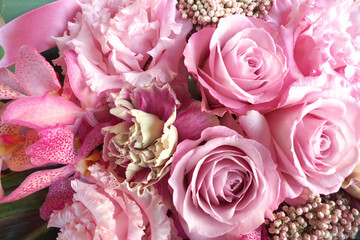 Pink roses in flower arrangement