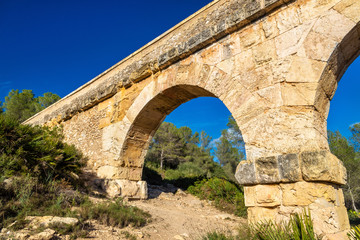 Fototapeta na wymiar Les Ferreres Aqueduct, also known as Pont del Diable - Tarragona, Spain