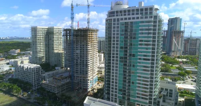 Aerial video of a highrise condominium under construction at Midtown Miami 4k 60p