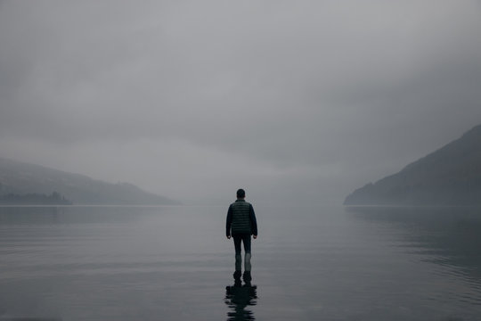 Man By Foggy Lake