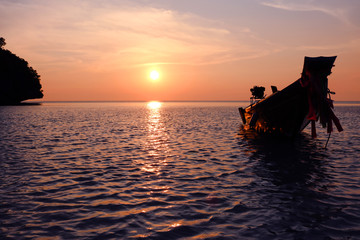 Sunset Beach with a long-tail boat.At ang thong island. 