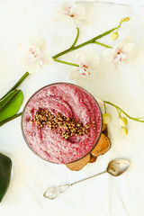 raw vegan yogurt with green buckwheat, berries and flax, top vie