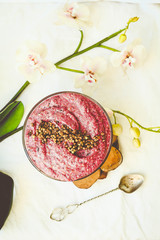 Fototapeta na wymiar raw vegan yogurt with green buckwheat, berries and flax, tone