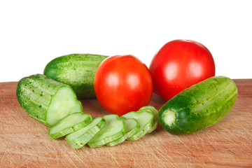 chop tomatoes and cucumbers