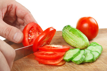 chop tomatoes and cucumbers