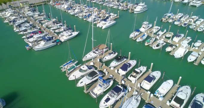Aerial video of boats at a marina in Miami
