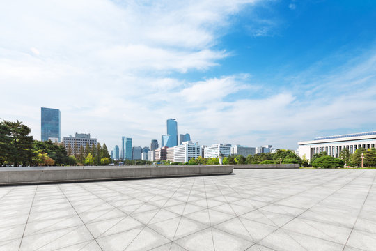 cityscape and skyline of seoul from empty brick floor