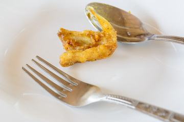 Stir Fried fish on white dish, diet concept