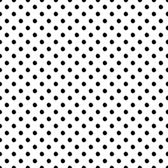 Hand-drawn polka dot seamless pattern. Black and white. Small dots.