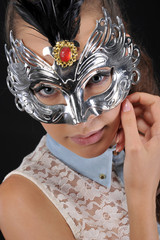 beautiful young women with venetian mask