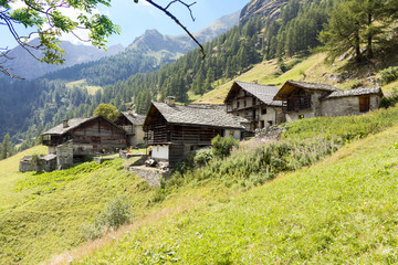 Fototapeta na wymiar Valley Aoste: Alpine panorama with Walser huts