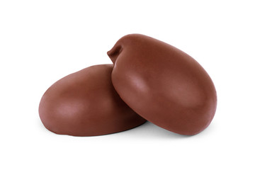 two chocolate covered marshmallows, part of one bitten off, isol