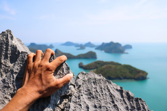 Hands Climbing The Rock At The Viewpoint Angthong Island. 