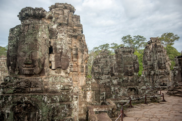 Fototapeta na wymiar Stone murals and sculptures Bayon Temple Angkor Thom, Cambodia.