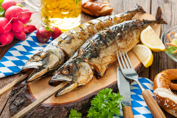 Grilled mackerel fish with beer and pretzel