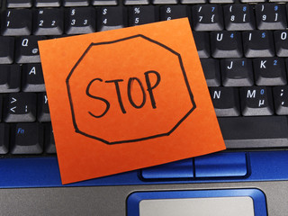 Memo note on notebook, drawing of stop street sign