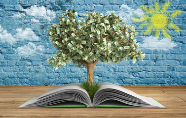 tree growing from book A big open book with tree Reading makes y
