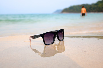 Fototapeta na wymiar Sunglasses on the Beach 