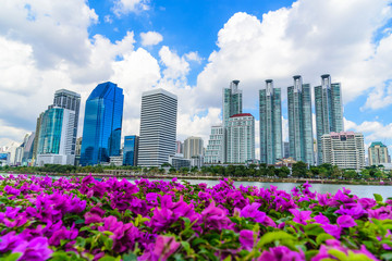 Cityscape image of Benchakitti Park at blue sky background in Bangkok, Thailand.