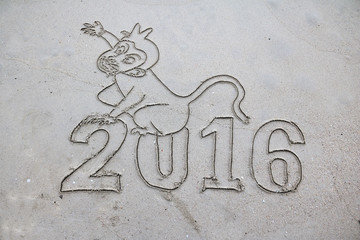 2016,The past year signs on the beach with the sea water. 