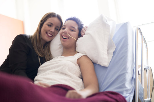 Sick Patient Lying On Bed In Hospital For Medical Background