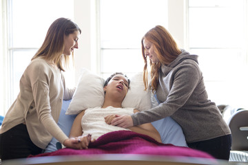 Sick patient lying on bed in hospital for medical background