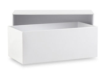 Open white box in front of a lid