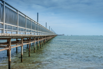 Fototapeta na wymiar pier to horizon wooden floor