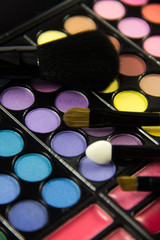 Naklejka premium Eyeshadow Palette. Decorative cosmetics. Makeup brushes