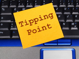 Memo note on notebook, tipping point