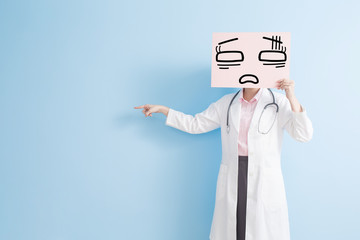 woman doctor take tired billboard