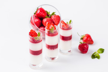 Strawberry Panna Cotta on a white background close