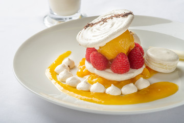 Dessert with raspberry and peach.