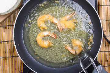 Chef frying shrimp Tempura