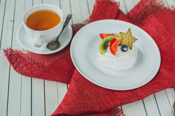 Beautiful white dessert on a red napkin