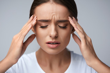 Health. Beautiful Woman Having Strong Headache, Feeling Pain