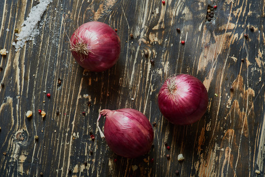 Red onion. Wooden Stand.