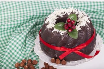 Tasty chocolate cake on a light background