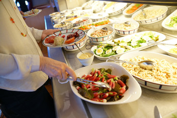 Closeup of delicatessen food set on restaurant buffet