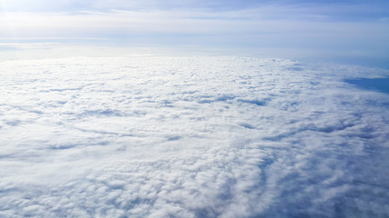 view the outer aircraft on the sky above the clouds in morning
