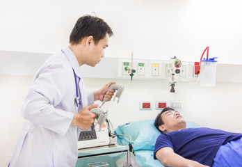 doctor use EKG or ECG prepare use defibrillator system in emerge - obrazy, fototapety, plakaty
